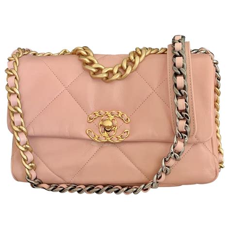 item cha396567 chanel handbag|Chanel pink ref purses.